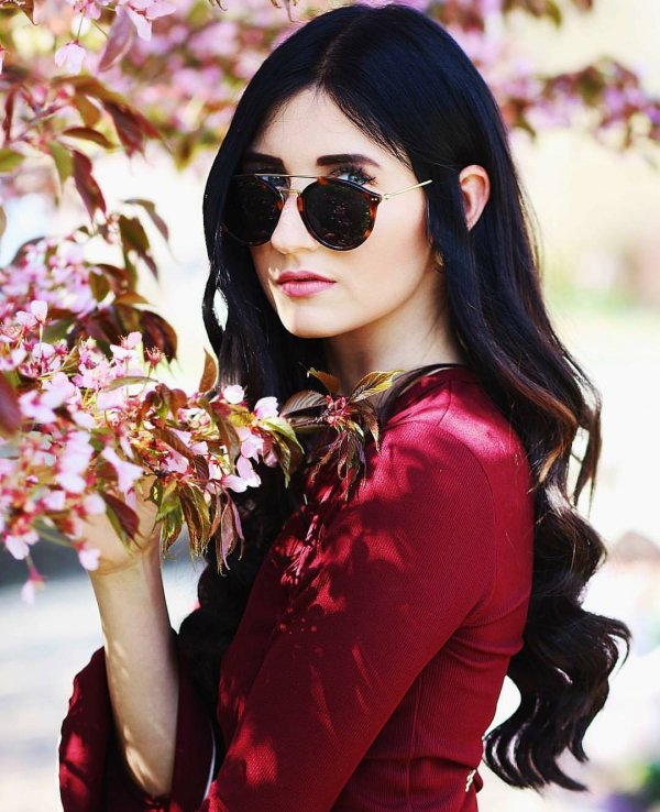 Portrait of good looking young woman with no makeup natural beauty has long  dark straight hair