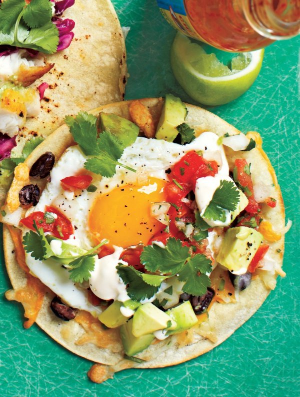 Taco with a Soft, Runny Egg Atop Beans, Cheese and Pico De Gallo