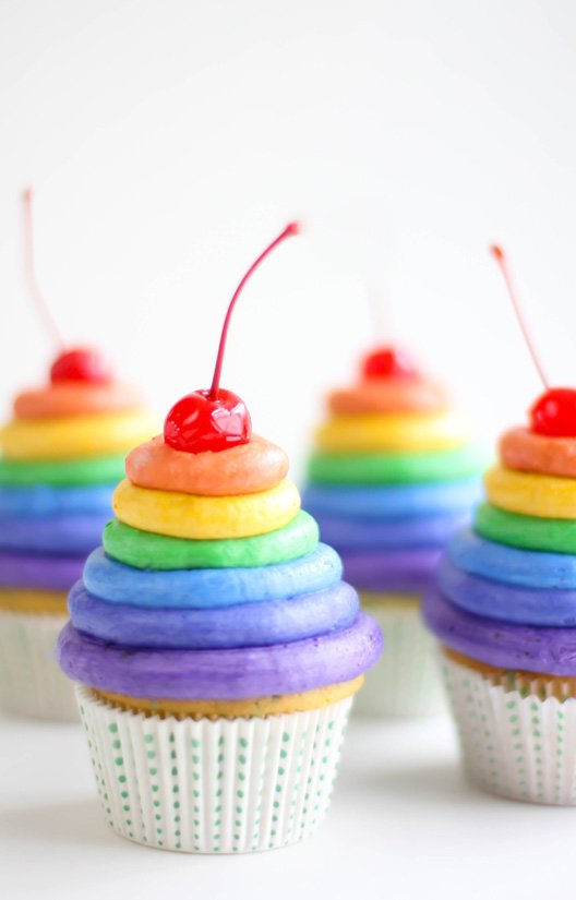 Cupcakes with Mounds of Rainbow Frosting