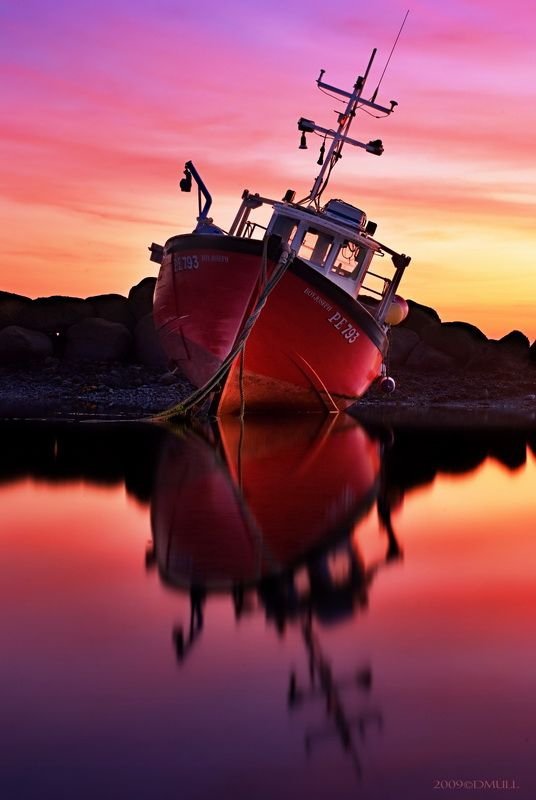 vehicle,sea,sunset,atmosphere of earth,reflection,