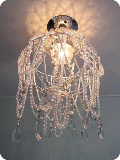 chandelier,light fixture,clothing,lighting,