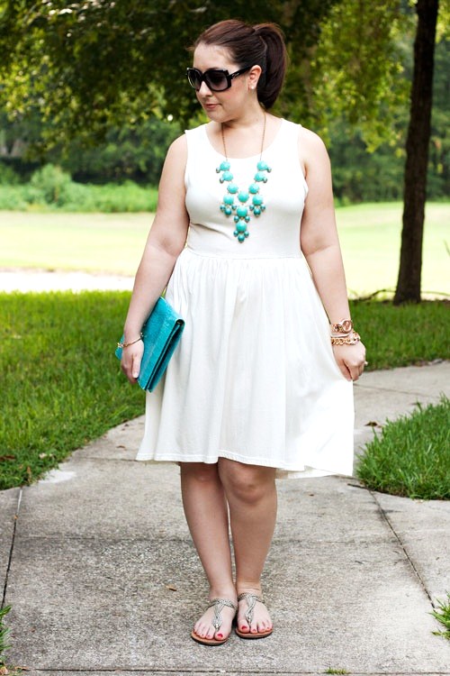 White dress 2025 with green accessories