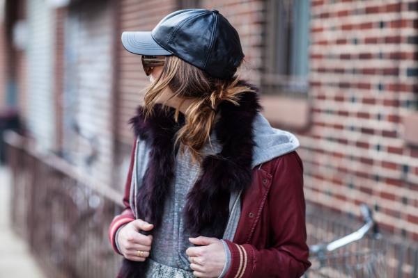 Vanessa Hudgens in black leather and shearling jacket and ripped