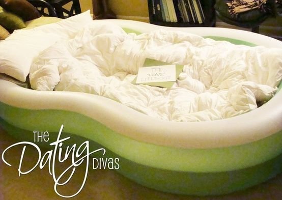 Blow up Kiddie Pool and Fill with Pillows and Blankets for a Cozy Bed