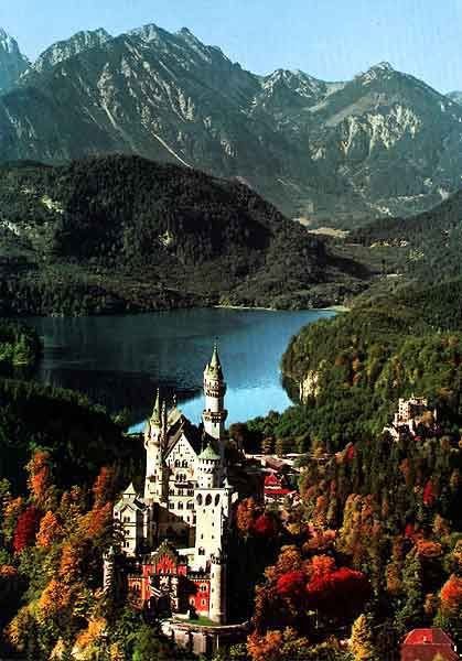 Neuschwanstein Castle,mountainous landforms,town,mountain,mountain range,