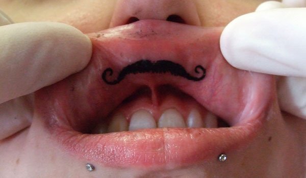 Pros And Cons Of Getting An Inner Lip Tattoo  Saved Tattoo