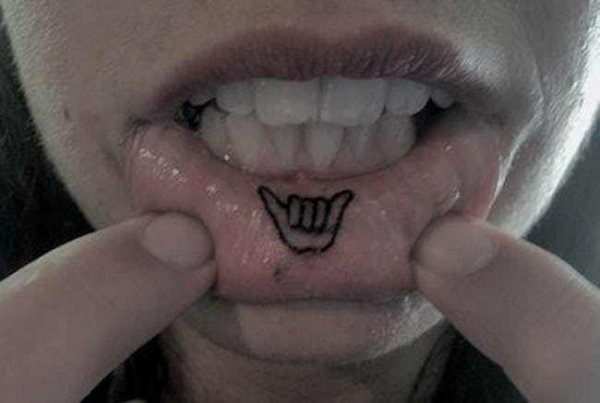 My friend on snapchat got a lip tattoo  rtrashy