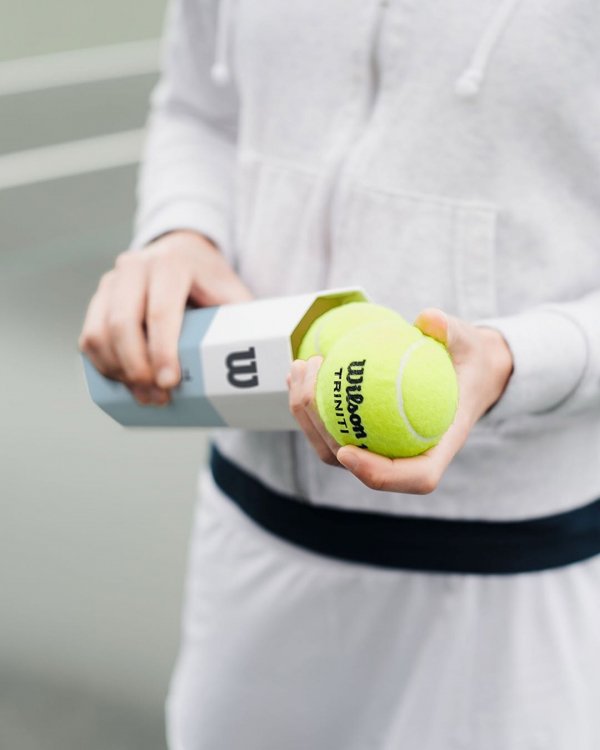 Tennis ball, Ball, Tennis, Arm, Sports equipment,