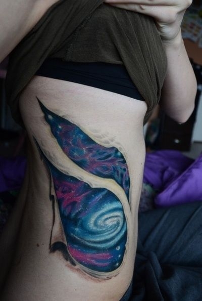 Blue Galaxy Tattoo with Ripped Effect