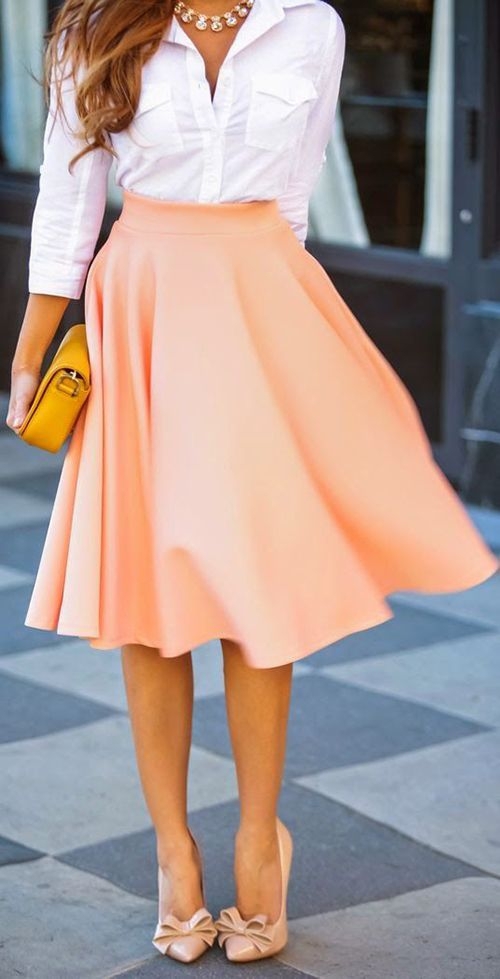 Add Some Pizzazz to Your Midi Skirt with a Pair of Cute Heels and a Statement Bag