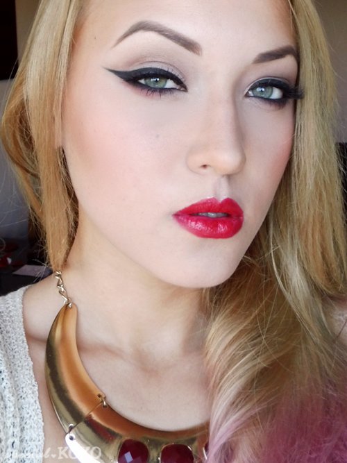 Winged Eyeliner and Red Lips Always Catch Your Eye