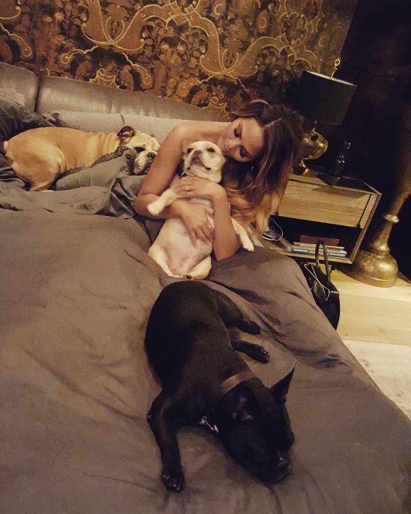 Chrissy Teigen & Loads of Puppies!