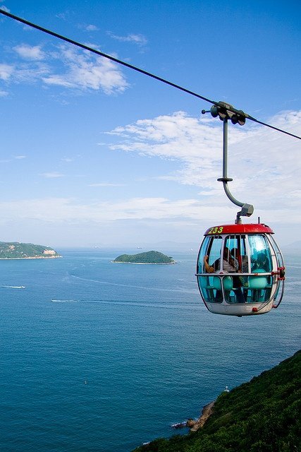 sky,cable car,sea,blue,vehicle,