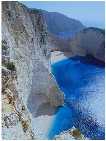 Navagio Bay,landform,geographical feature,cliff,coast,