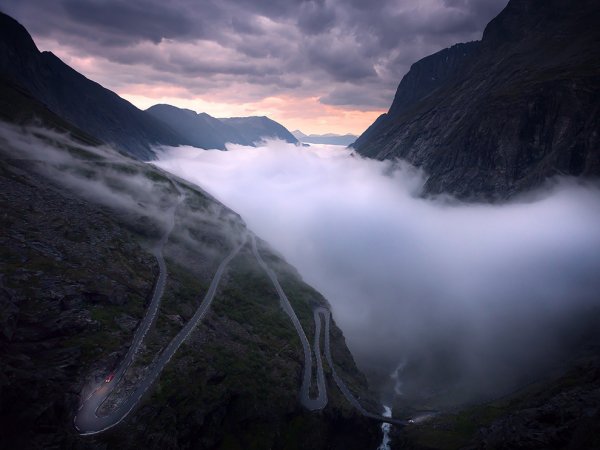 The Midnight Sun Setting through Fog, Trollstigen, Norway