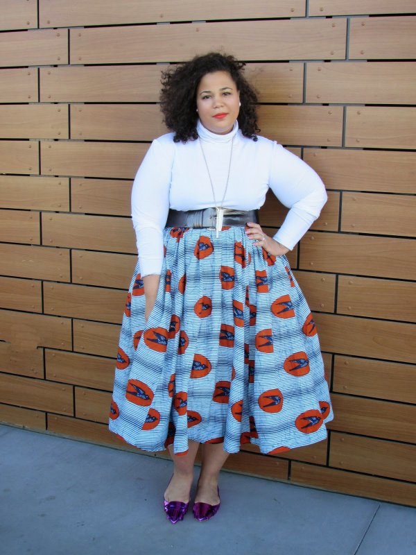 With a Voluminous Midi Skirt