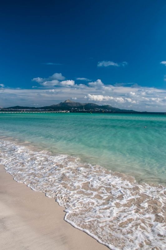 sky,beach,sea,shore,body of water,