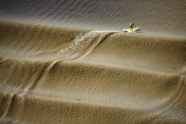 Pororoca Amazon Surfing in Cutias, Brazil