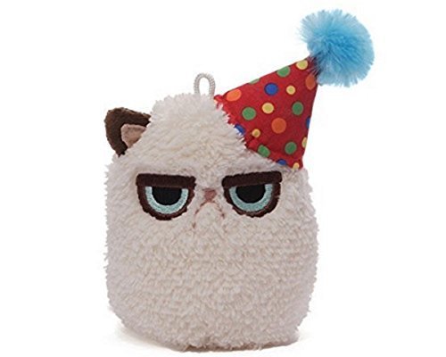 stuffed toy, bird, owl, toy, hairstyle,