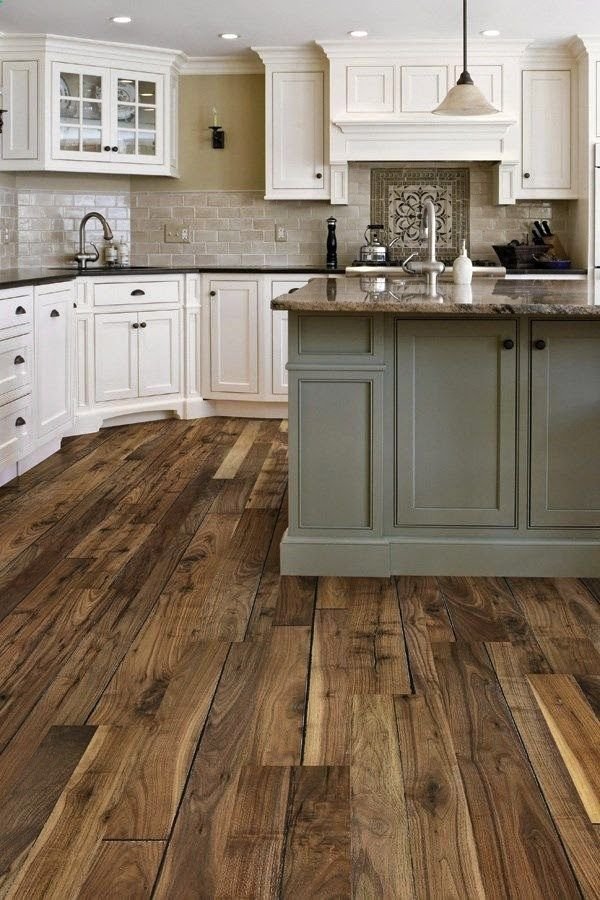 Muted Green Island with White, Airy Cabinets