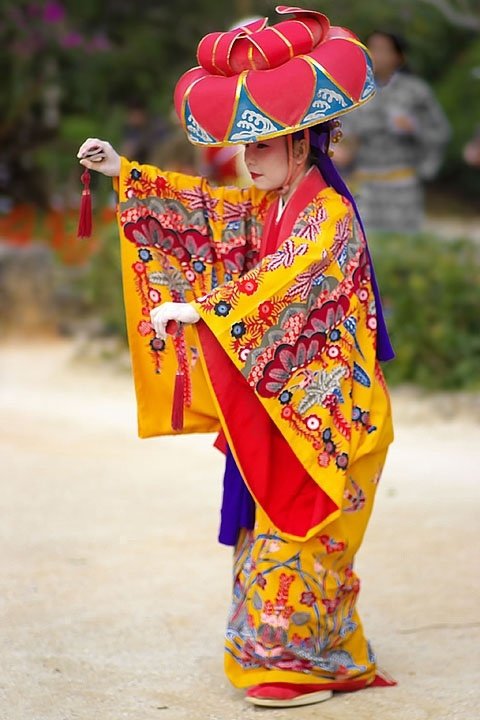 person,clothing,woman,yellow,matador,