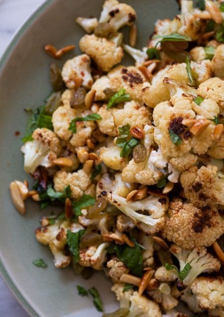 Roasted Cauliflower, Golden Raisin and Candied Almond Salad with Harissa Dressing