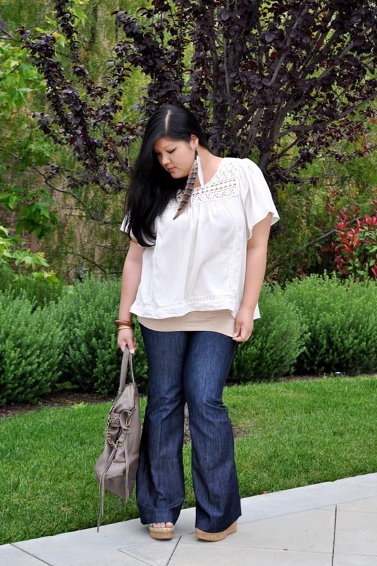 With a Flowy Top and Feather Earrings