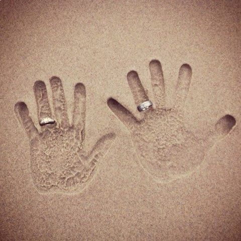 Handprints in the Sand