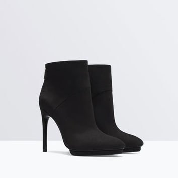 footwear,leather,boot,leg,high heeled footwear,