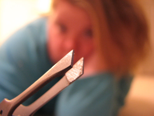 Tweezers or Nail Clippers