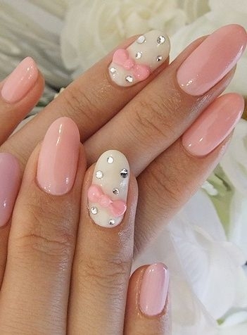 Pastel Pink and White Nails with Rhinestones and a Feminine Bow