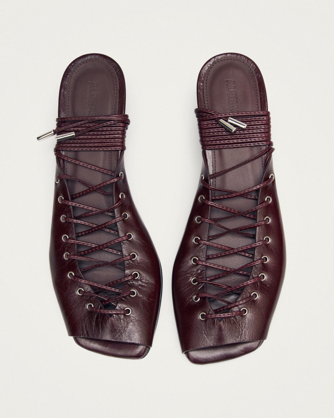 Discover the Allure of Angelica Burgundy Leather Sandals and...